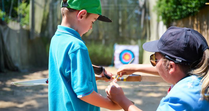 beavers doing archery